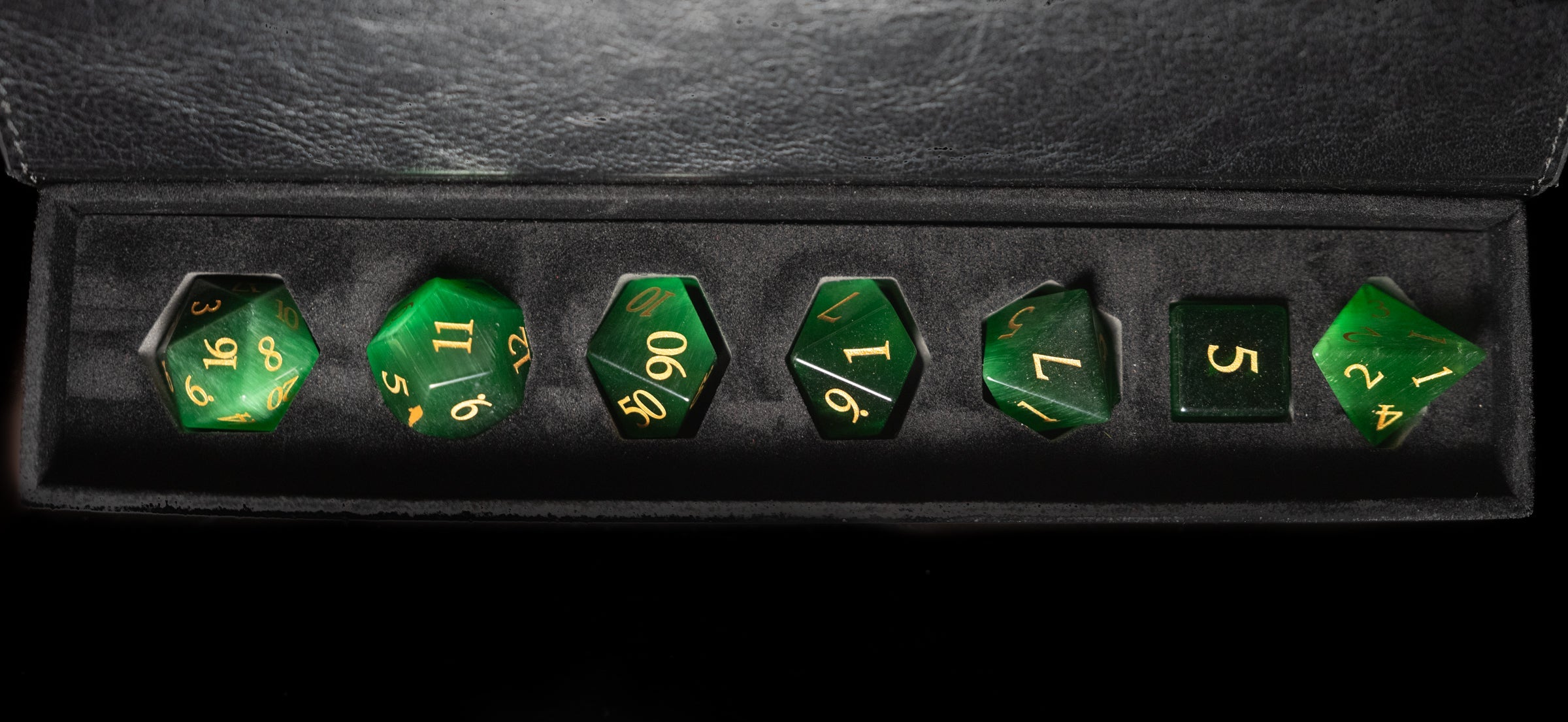 green cat's eye glass and gemstone polyhedral DnD RPG dice set