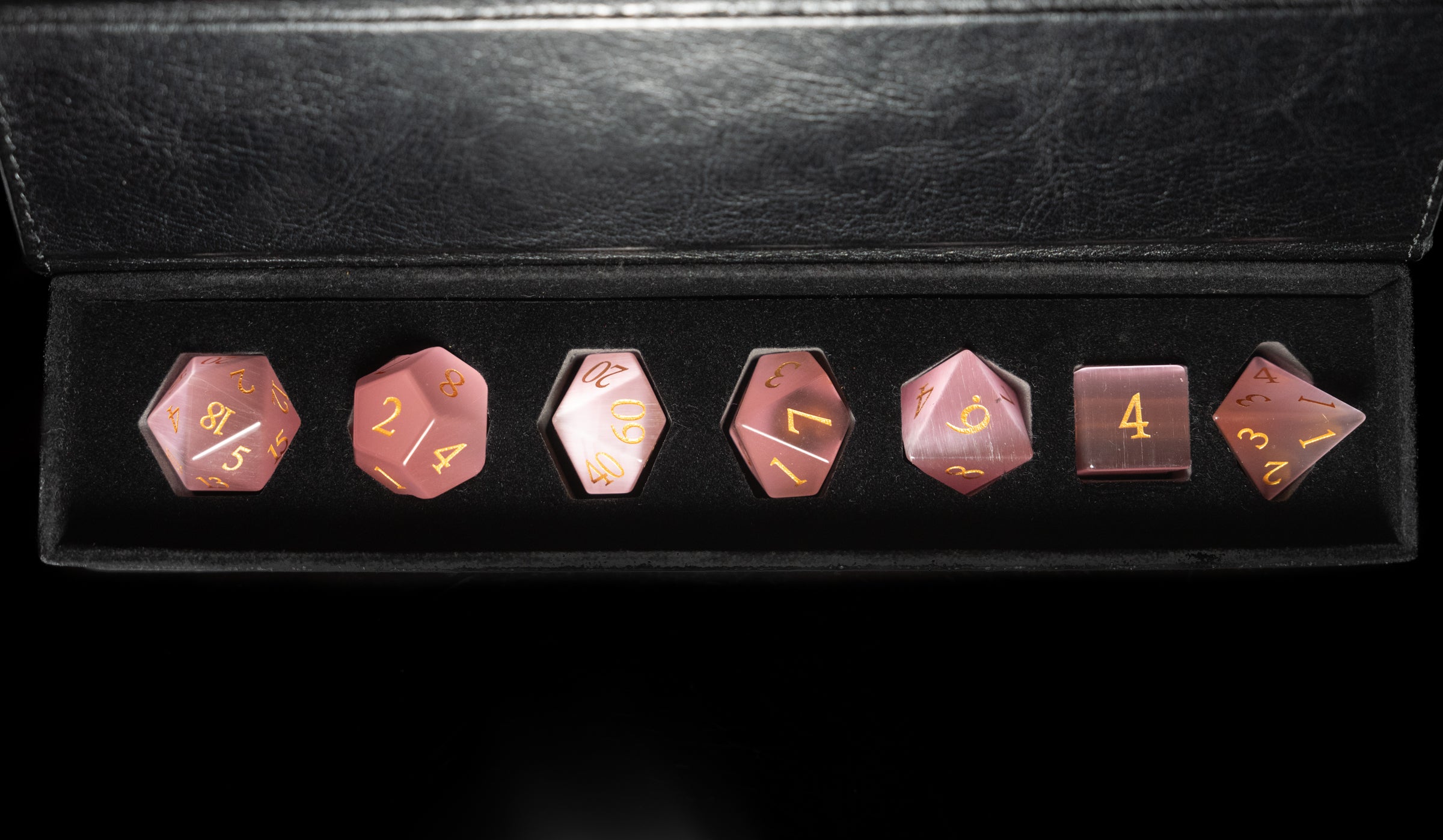 white cat's eye glass and gemstone polyhedral DnD RPG dice set