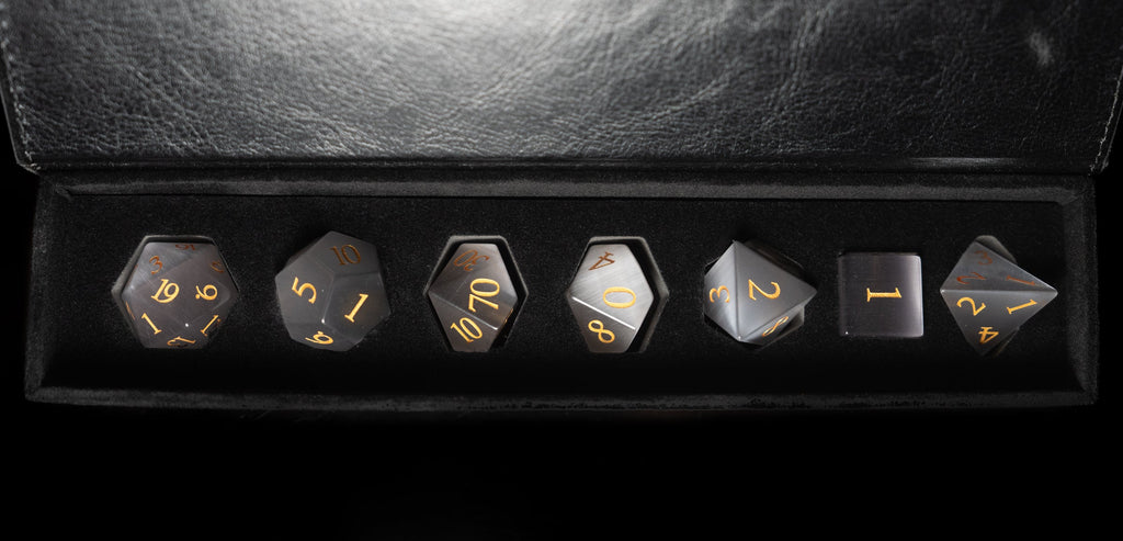 grey cat's eye glass and gemstone polyhedral DnD RPG dice set