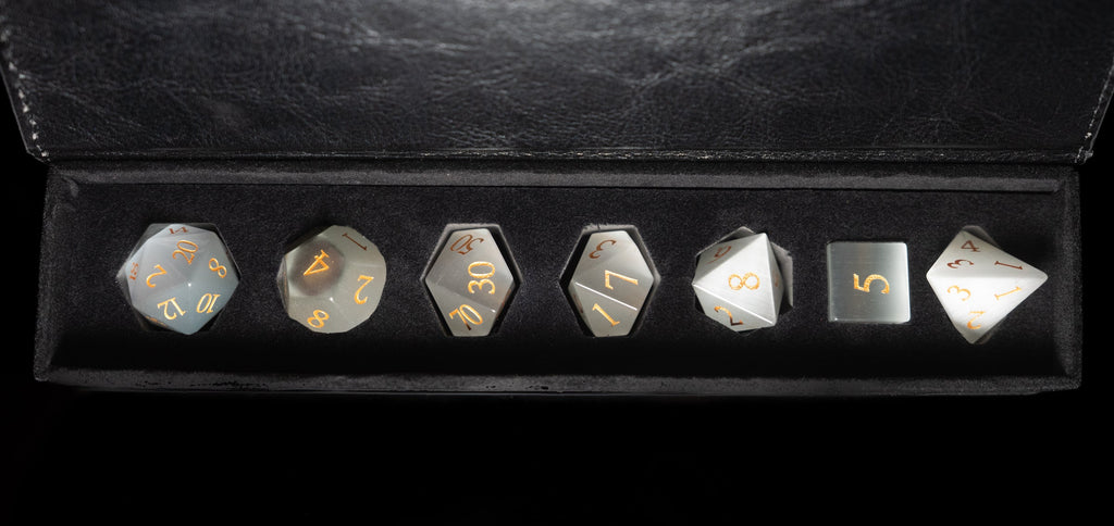 white cat's eye glass and gemstone polyhedral DnD RPG dice set