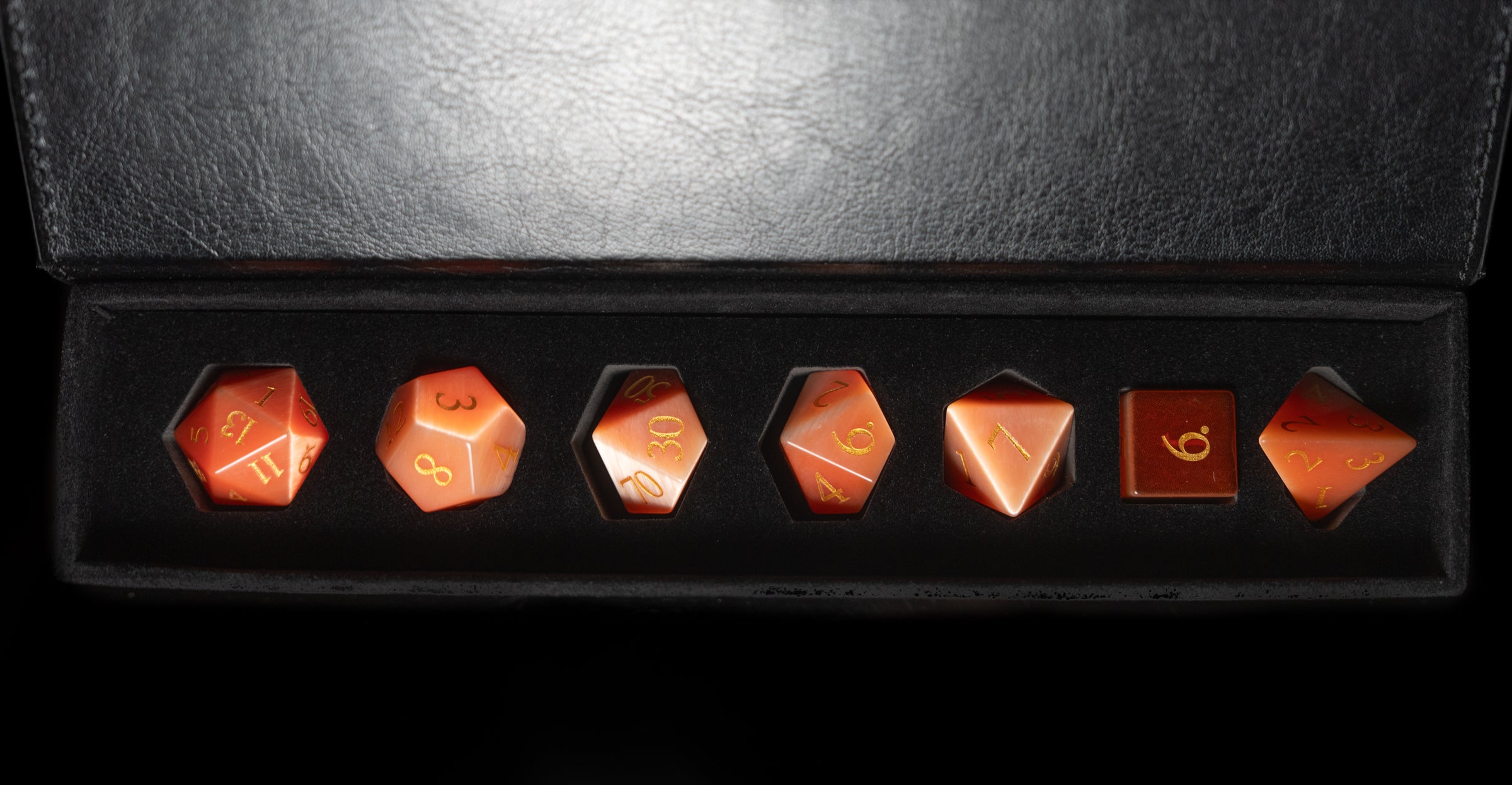 strawberry cat's eye glass and gemstone polyhedral DnD RPG dice set