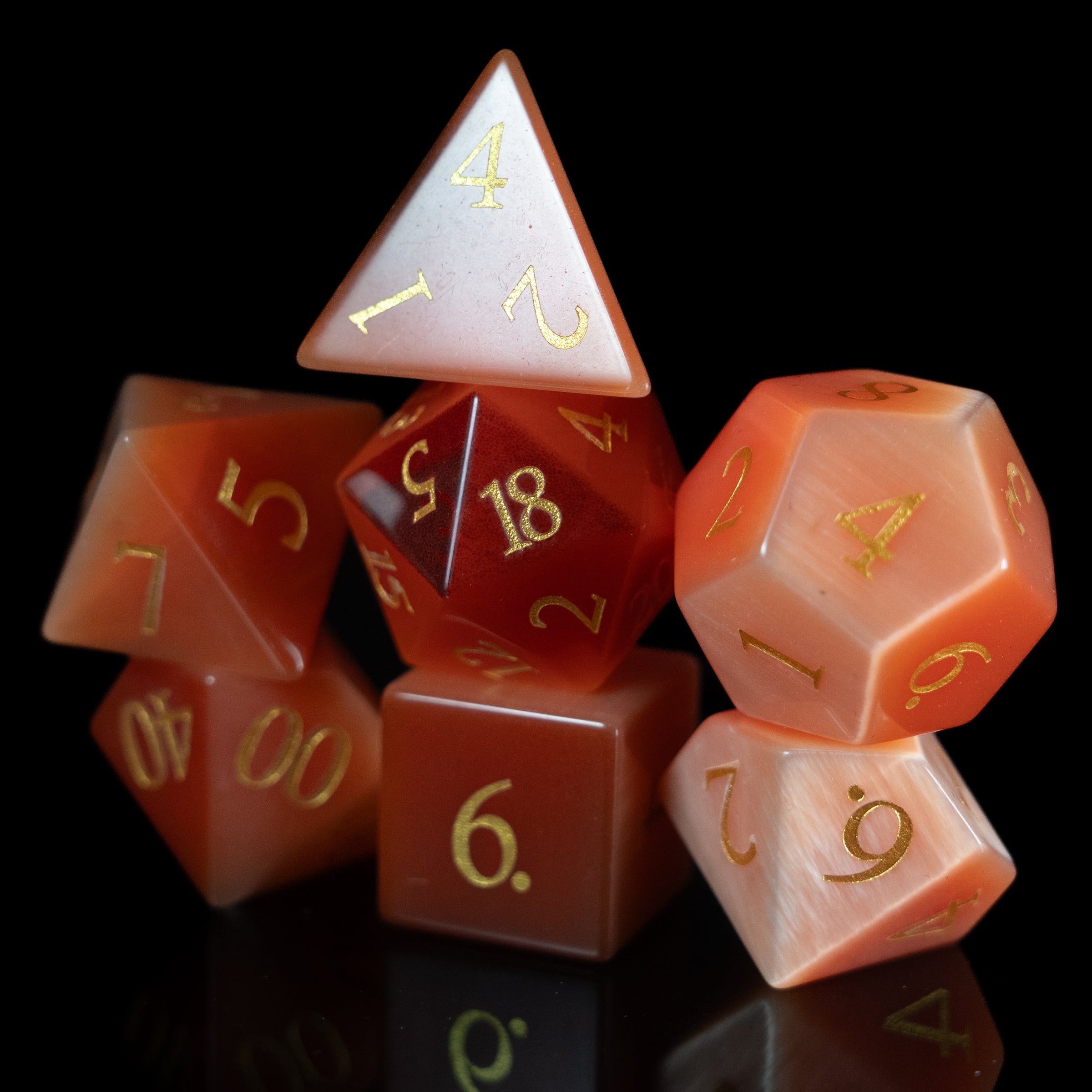 strawberry cat's eye glass and gemstone polyhedral DnD RPG dice set