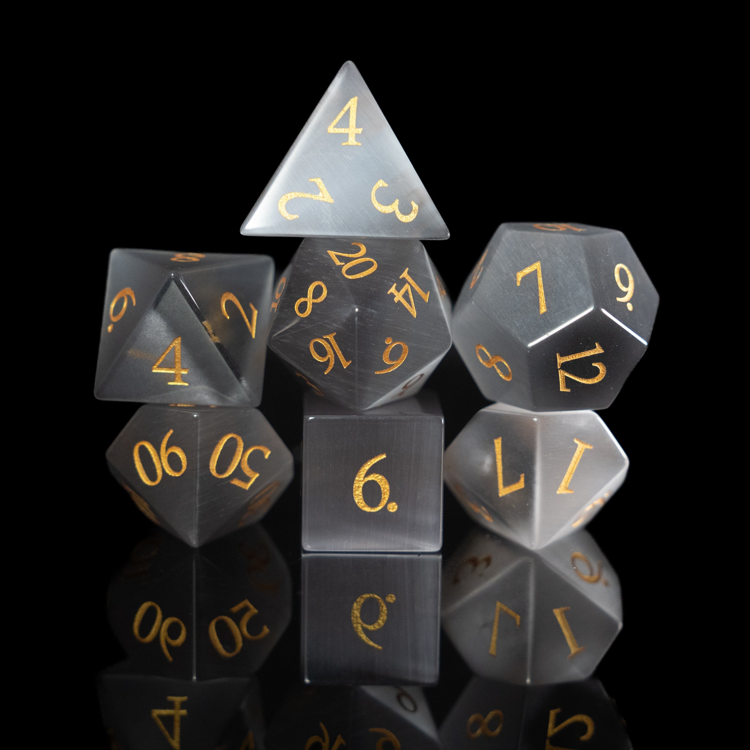 grey cat's eye glass and gemstone polyhedral DnD RPG dice set