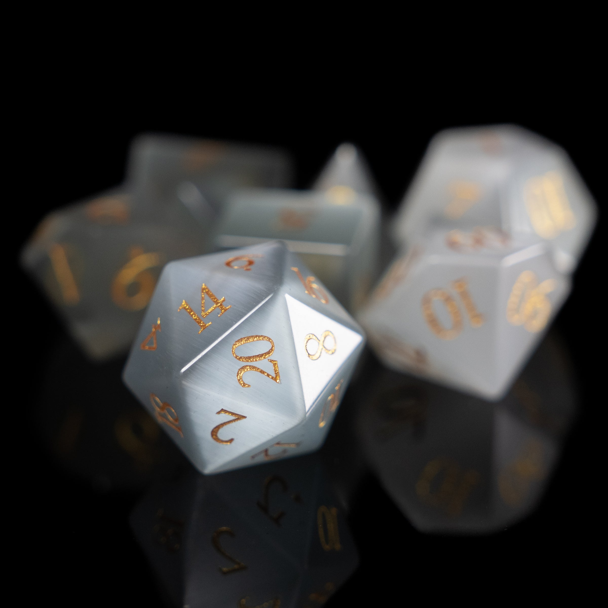 white cat's eye glass and gemstone polyhedral DnD RPG dice set