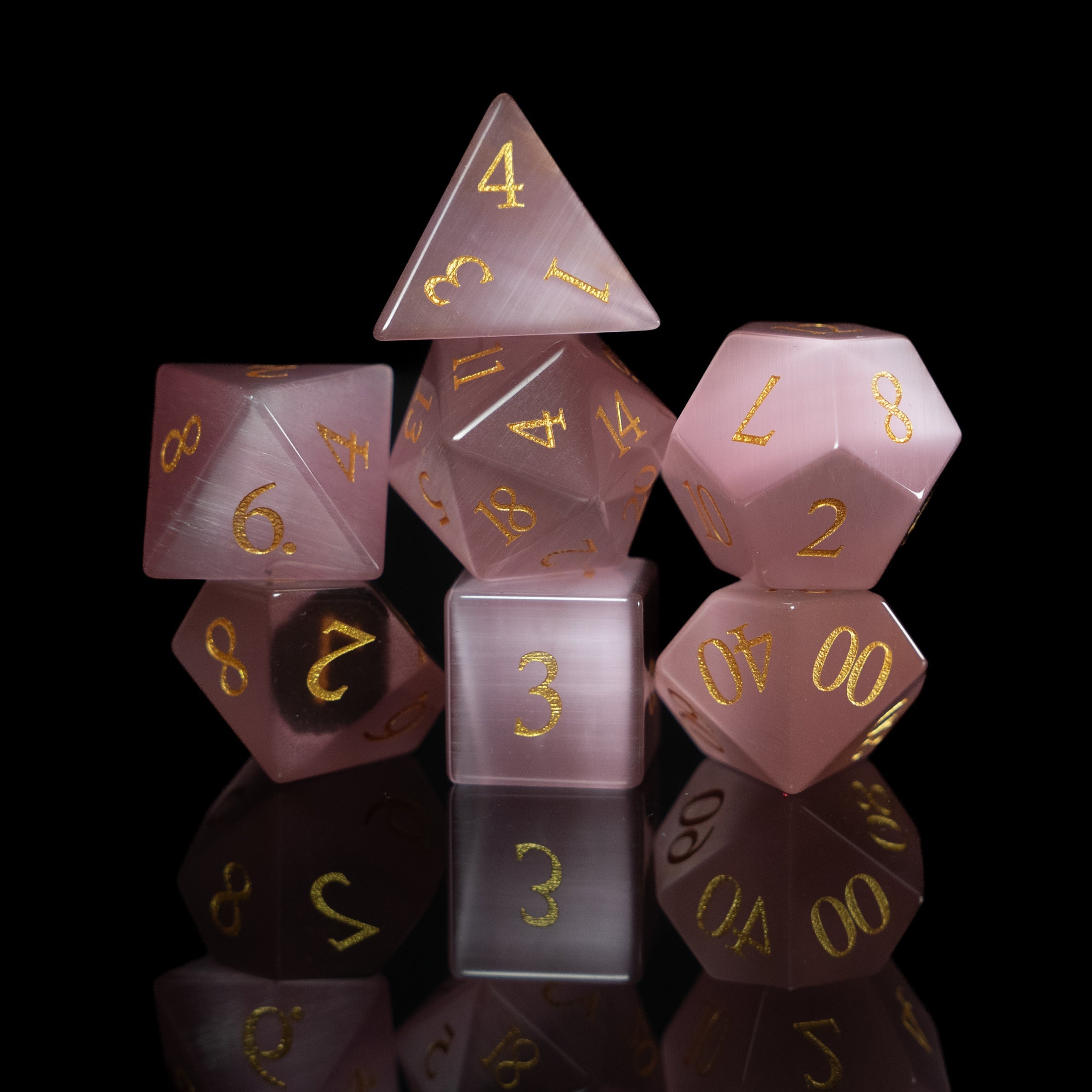 pink cat's eye glass and gemstone polyhedral DnD RPG dice set