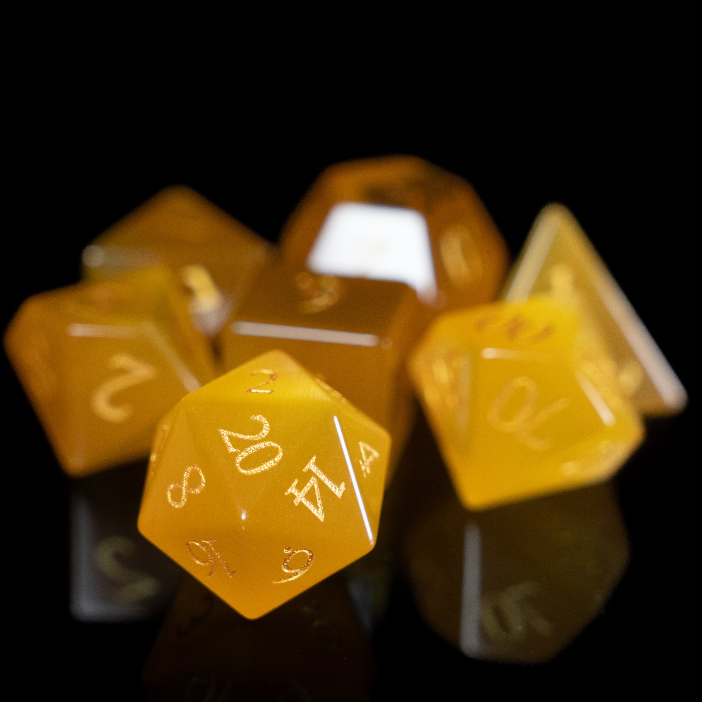 yellow cat's eye glass and gemstone polyhedral DnD RPG dice set