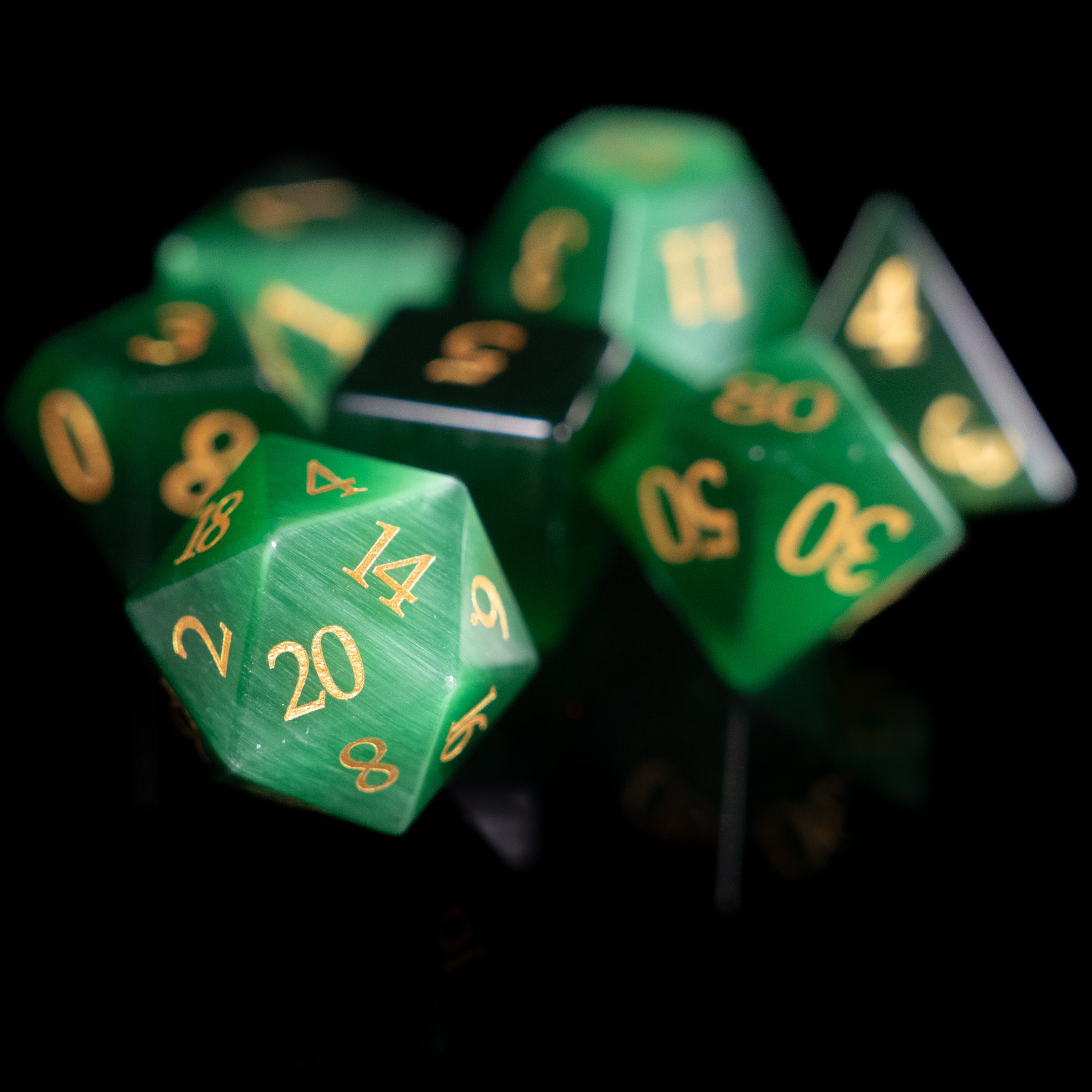green cat's eye glass and gemstone polyhedral DnD RPG dice set