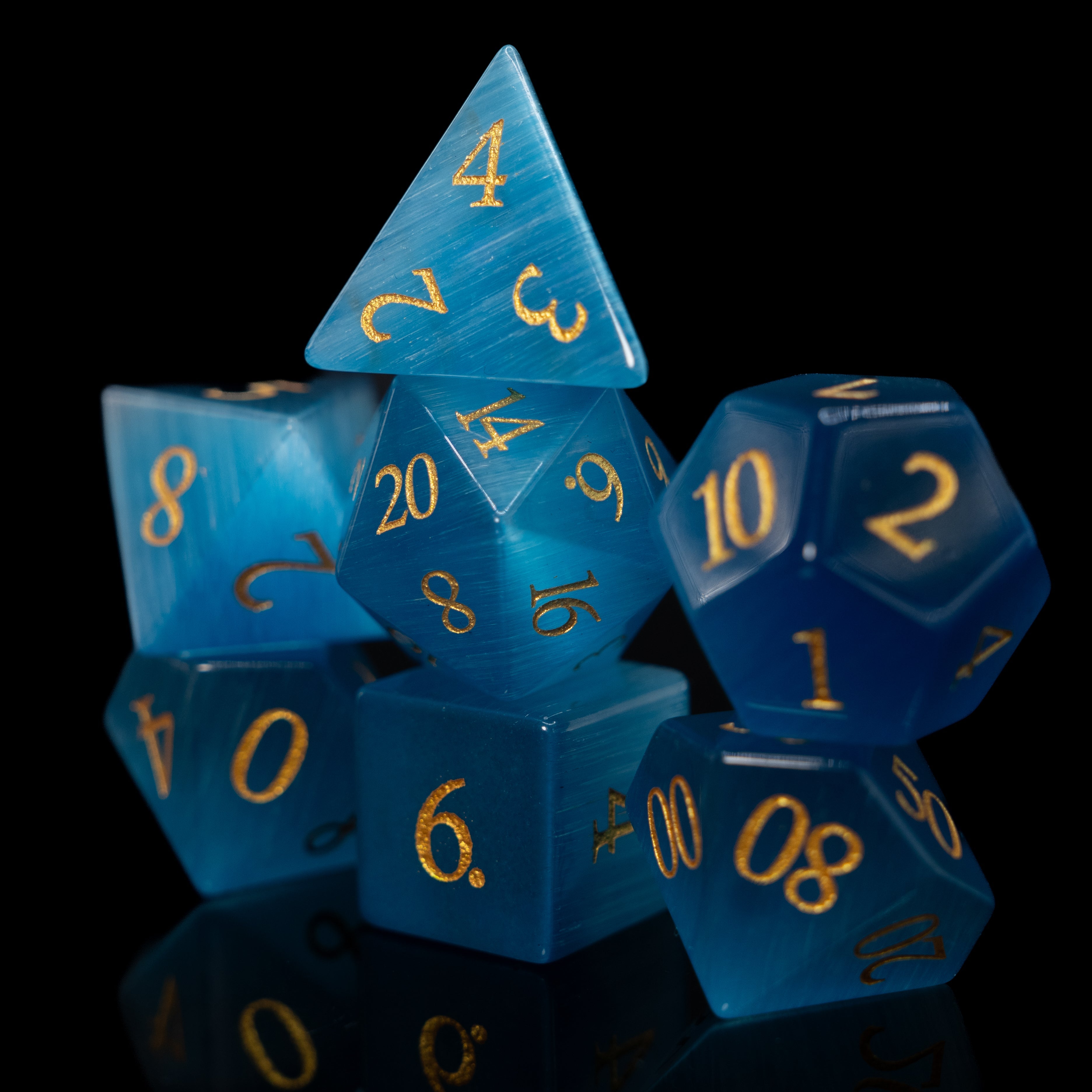 sky blue cat's eye glass and gemstone polyhedral DnD RPG dice set