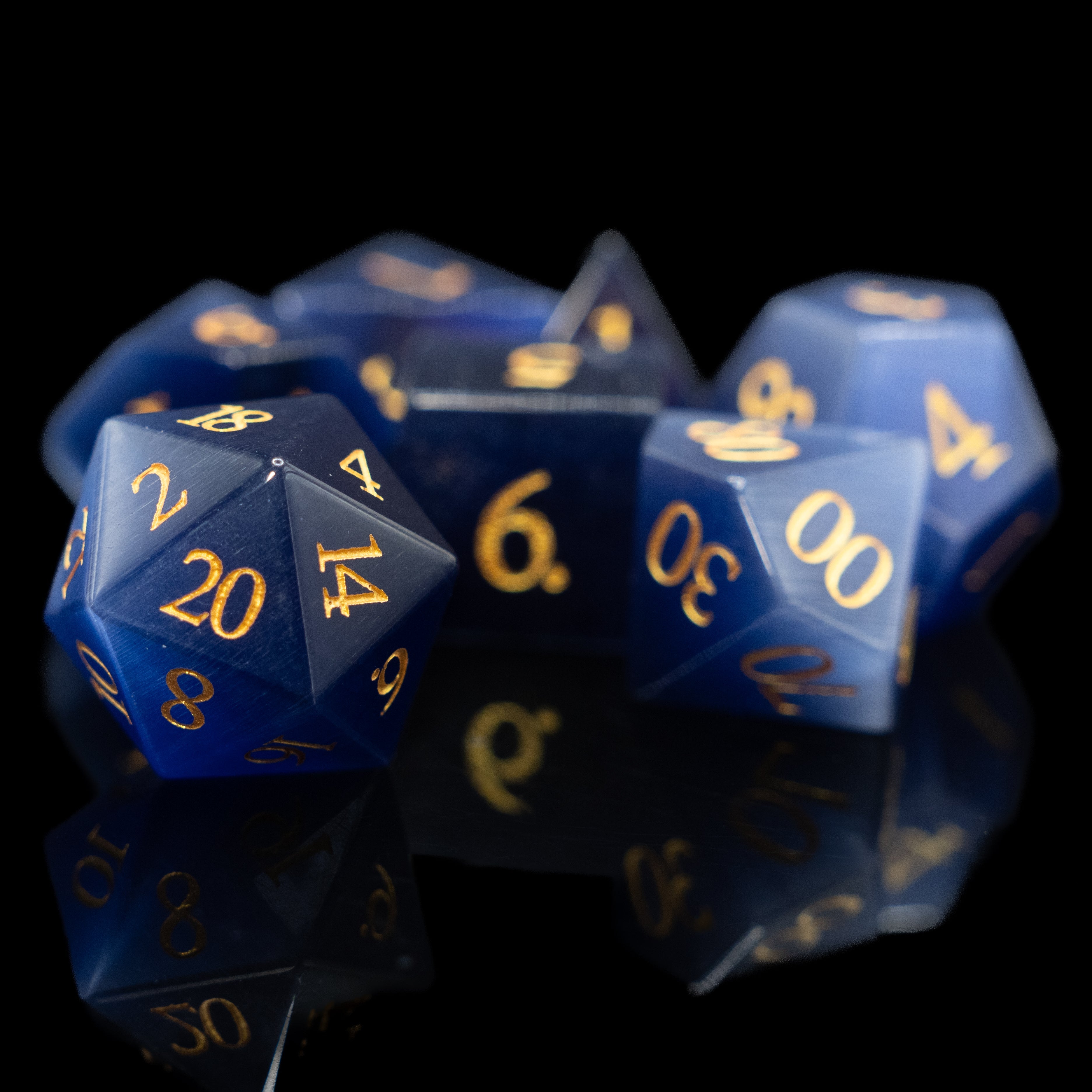 royal blue cat's eye glass and gemstone polyhedral DnD RPG dice set